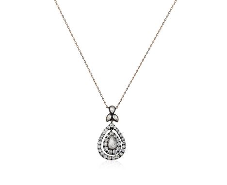 A Diamond Necklacethe rose cut pear diamond within a border of old cut diamonds, suspended within a further frame of old cut 