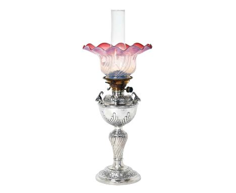 A Victorian Silver Oil-Lamp,  by John Round and Son Ltd., Sheffield, 1890 the base chased with foliage on a matted ground, th