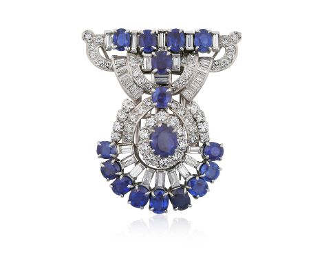 A Sapphire and Diamond Brooch/Pendantthe articulated scroll motif set throughout with oval cut sapphires, and baguette cut an