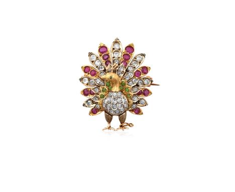 A Ruby, Diamond and Green Garnet Broochrealistically modelled as a peacock with a raised train, pavé set throughout with eigh