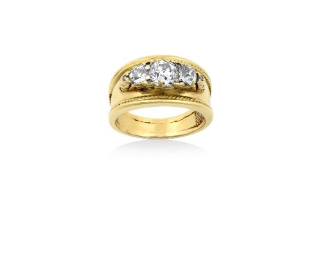 A Diamond Three Stone Ringthe graduated old cut diamonds in yellow claw settings, spaced by rose cut diamond accents, with a 