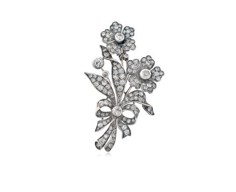 A Victorian Diamond Broochrealistically modelled as ribbon tied flowers, set throughout with old cut, eight-cut and round bri