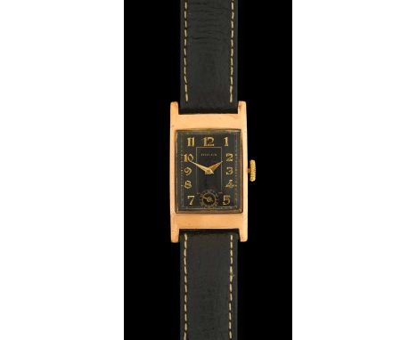 Rolex: A 9 Carat Gold Rectangular Shaped Wristwatch, signed Rolex, 1937, manual wound lever movement signed Rolco, black dial