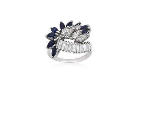 A Sapphire and Diamond Cluster Ringa row of baguette cut diamonds terminates to a spray motif comprising of marquise cut sapp