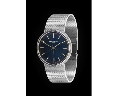 Patek Philippe: A Fine 18 Carat White Gold Automatic Centre Seconds Wristwatch, signed Patek Philippe, Geneve, model: Calatra