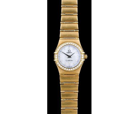 Omega: A Lady's 18 Carat Gold Diamond Set Wristwatch, signed Omega, model: Constellation, ref: 11677500, circa 2008, (calibre