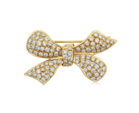 A Diamond Broochthe stylised bow motif set throughout with round brilliant cut diamonds, in yellow pavé settings, total estim