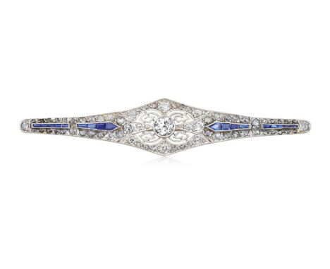 An Art Deco Sapphire and Diamond Broochthe tapered bar with an old cut diamond centrally, to a pierced openwork surround set 