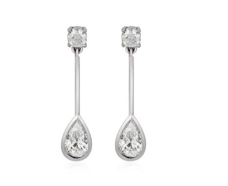 A Pair of 18 Carat White Gold Diamond Drop Earringsthe round brilliant cut diamond in claw settings, suspends a pear cut diam