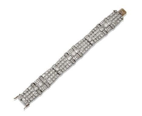 Property of a Lady An Art Deco Diamond Braceletof geometric form, set throughout with round brilliant cut, baguette cut and e