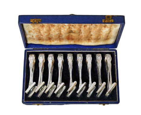 A Cased Set of Nine Edward VII Silver Individual Asparagus-Tongs,  by William Hutton and Sons Ltd., London, 1906, Retailed by