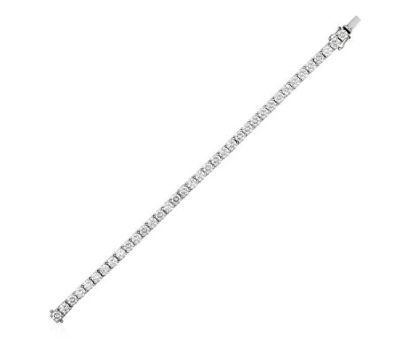 An 18 Carat White Gold Diamond Line Braceletthe thirty-seven round brilliant cut diamonds in four claw settings, total estima
