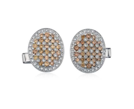 A Pair of Diamond Cufflinksthe oval plaques set throughout with round brilliant cut and eight-cut white and fancy coloured di