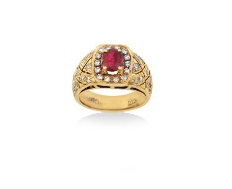 A Ruby and Diamond Cluster Ringthe rectangular cushion cut ruby within a border of round brilliant cut diamonds, to round bri