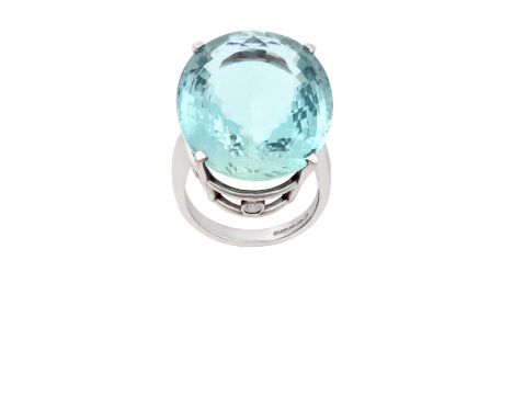 An 18 Carat White Gold Aquamarine and Diamond Ringthe oval cut aquamarine in a four claw setting, to a round brilliant cut di