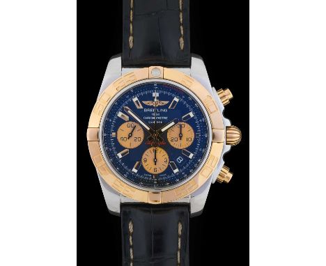 Breitling: A Steel and Gold Automatic Calendar Chronograph Wristwatch, signed Breitling, Chronometer, model: Chronomat 44, re