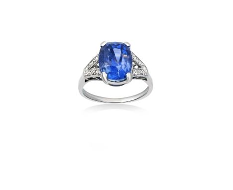 A Sapphire and Diamond Ringthe cushion cut sapphire in a white four claw setting, to eight-cut diamond set parted shoulders, 