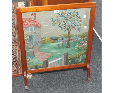 A mahogany firescreen,  needlework panel, c.1930s