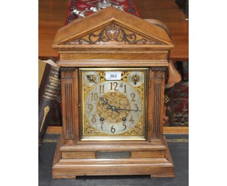 An oak Winterhalter and Hoffmier bracket clock, the silvered chapter ring with Arabic numerals, twin winding holes, Chime/Sil