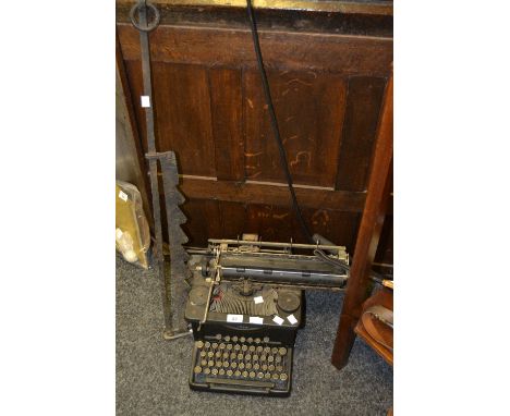 L C Smith & Corona Typewriter;  a pair of Tailor's shears;  a meat jack 