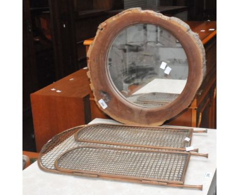 A copper fireguard; a framed mirror