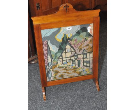 An Arts and Crafts tapestry framed firescreen