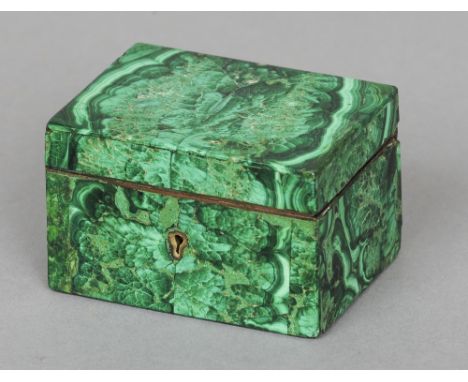 A late 19th century malachite trinket box
Of hinged rectangular form, the front with a brass escutcheon.  7 cm wide. CONDITIO