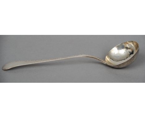 A George III bright cut decorated Old English pattern silver ladle, hallmarked London 1777, maker's mark of JH
32 cm long. CO