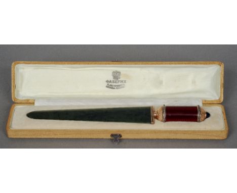 A cased Russian spinach jade silver and enamel decorated paper knife
The guilloche enamel decorated handle set with two bands