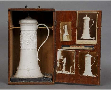 An Edwardian artist's plaster model design for a tankard in repousse silver by Sylvan G. Boxsius
Housed in a wooden carrying 