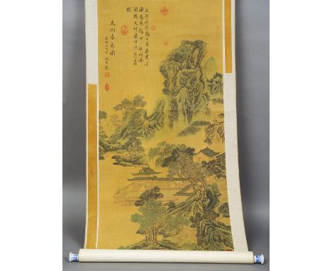 A Chinese scroll painting 
Depicting a palatial building in a mountainous landscape, with calligraphy and red printed seal ma