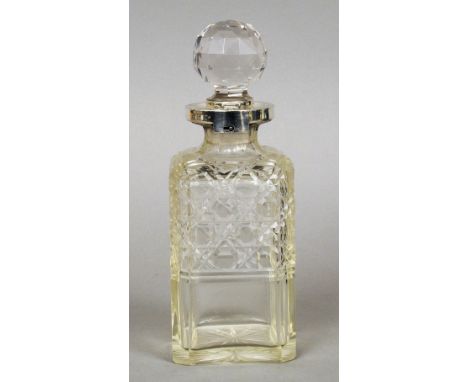 A Victorian silver mounted cut glass decanter, hallmarked London 1898, maker's mark indistinct
The silver neck with a patent 