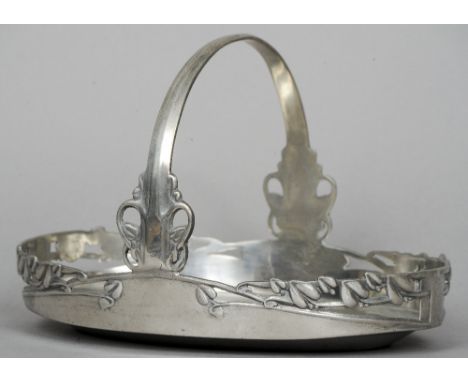 ARCHIBALD KNOX (1864-1933) British, for Liberty & Co.
An "English pewter" oval basket
With pieced stylised floral border and 