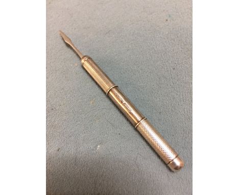 A silver double ended toothpick, hallmarked Birmingham 1964, maker's mark of S.J. Rose & Son
The case with engine turned deco