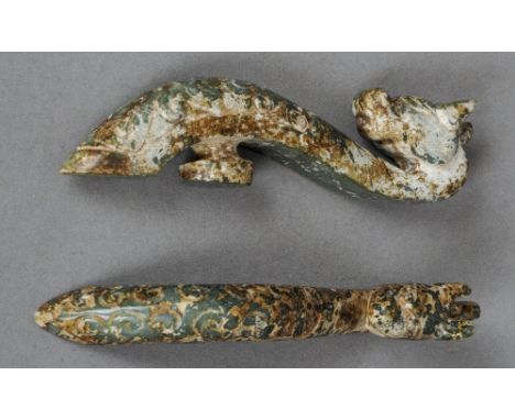 Two Chinese jade belt hooks
Each formed as a dragons head.  Each 11.5 cm high.  (2) CONDITION REPORTS: Some fritting, general