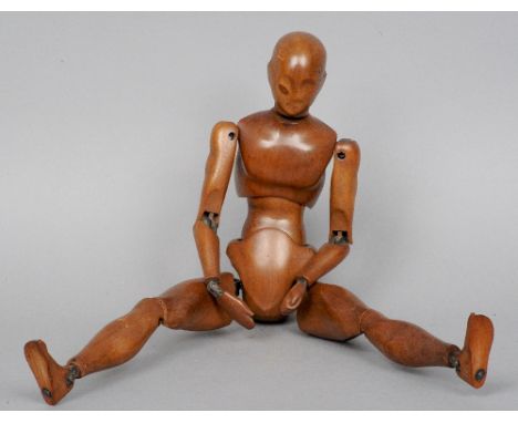 A late 19th century French walnut artists mannequin lay figure by Brevette, Paris
Typically modelled with articulated joints,