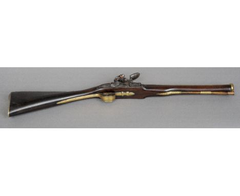 An 18th century coaching blunderbuss by James Barber, London
With three stage brass barrel, signed lock plate, acorn finial t