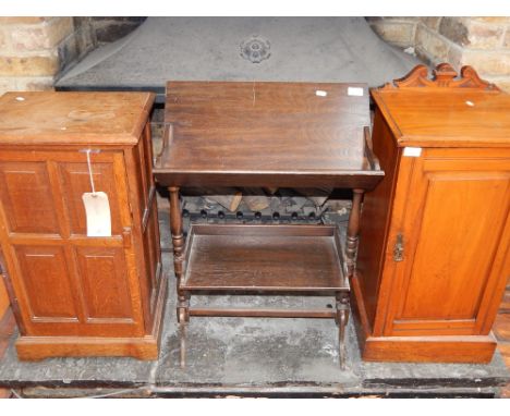 An early 20th century oak panelled cupboard, the fielded multi-panel door enclosing a shelf, W. 442cm, together with a walnut