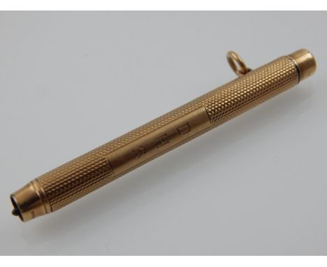 A Sampson Mordan & Co., 9ct gold propelling pencil, marks for 1933, with engine turned decoration and Asprey retail mark, 17g