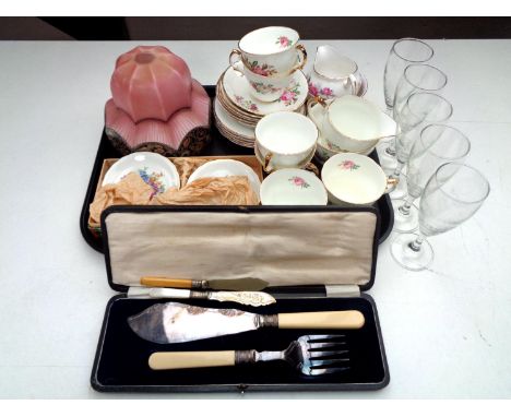 A tray containing Regency bone china tea service, glasses, pink Art Deco glass shade, cased servers.  
