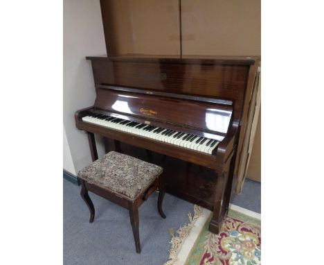 A Coronet model mahogany cased straight strung piano by Boyd of London together with storage piano stool.  