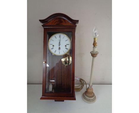 Comitti of London eight day wall clock and a contemporary table lamp 