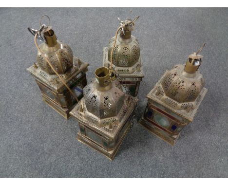 Four Moroccan style light fittings.   