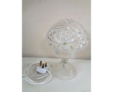 A cut glass table lamp with shade 