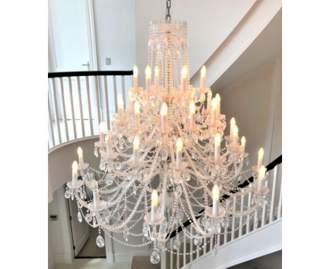 A large and impressive forty-branch crystal chandelier, modern, consisting of five tiers, the lower three each holding twelve