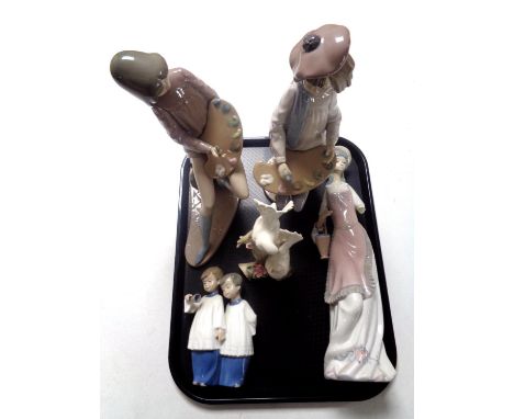 A tray of two Nao figures of painters, a further Nao figure of choir boys and two Spanish figures (a/f)