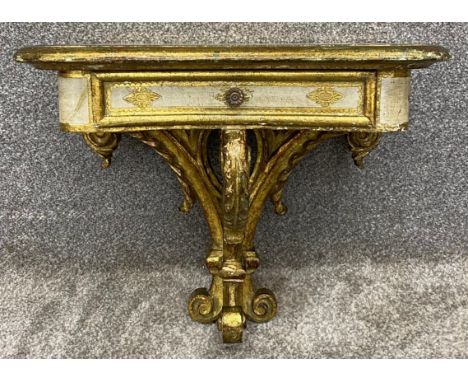 A vintage Florentine giltwood and painted console table. H.40 W.46cm
