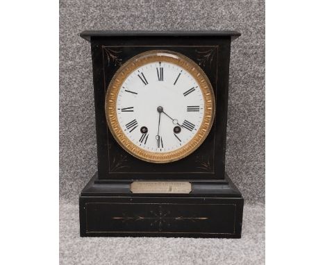 A 19th century slate mantel clock with eight day movement and white enamel dial. H.34.5 W.28 D.16.5cm