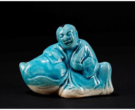 A Turquoise Glazed Waterdropper, China, Kangxi Period (1661-1722)l cm 7,1绿松石釉水滴壶，中国，康熙时期（1661-1722）The lot is accompanied by 