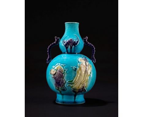 A double gord turquoise-aubergine glazed vase, China, Kangxi period (1661-1722)h cm 17双柄绿紫釉瓷花瓶，中国，康熙时期（1661-1722)PROVENANCELa
